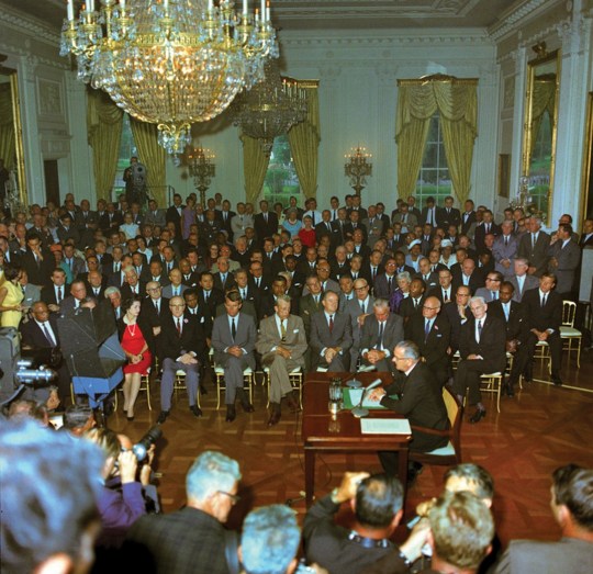 President Lyndon B Johnson signs Civil Rights Act of 1964a